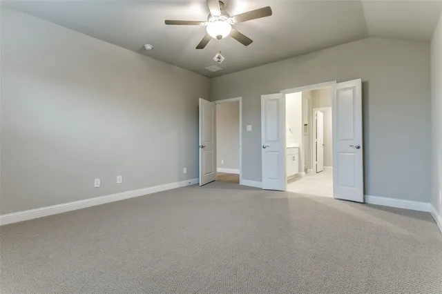a bathroom with a double vanity sink mirror and shower
