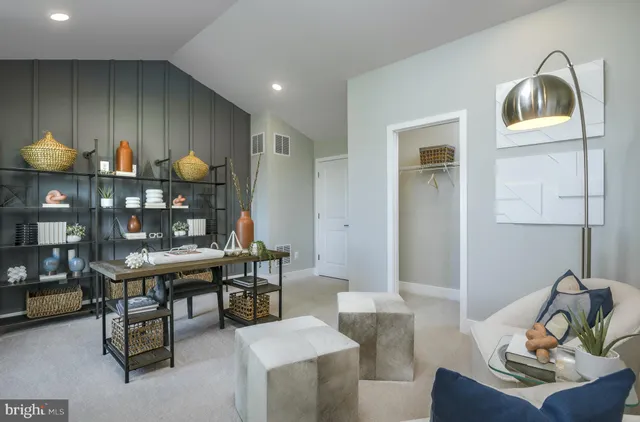 a room with furniture and wooden floor