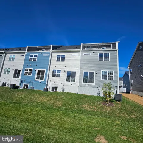 a view of a house with a big yard