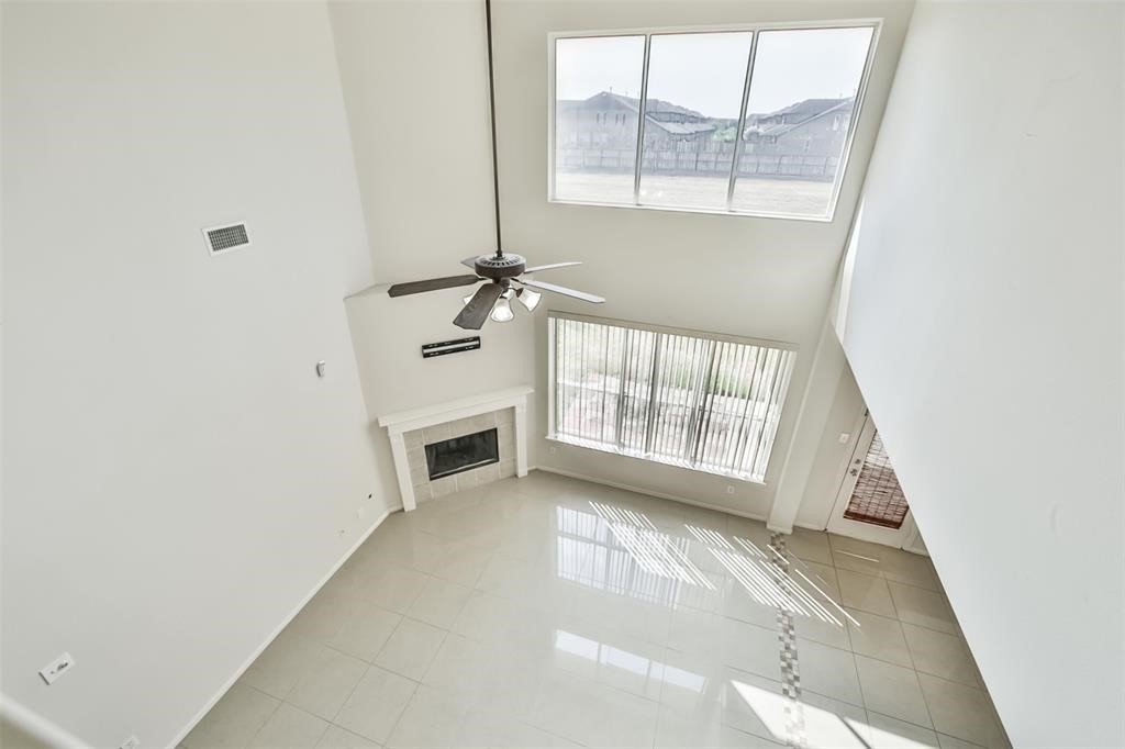 911 Merlin Roost Katy, TX 77494 - Photo 33 of 42 an empty room with windows