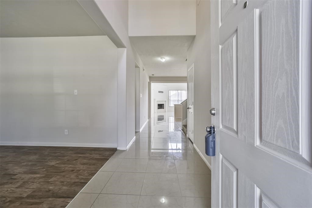 911 Merlin Roost Katy, TX 77494 - Photo 6 of 42 a bathroom with a sink and shower
