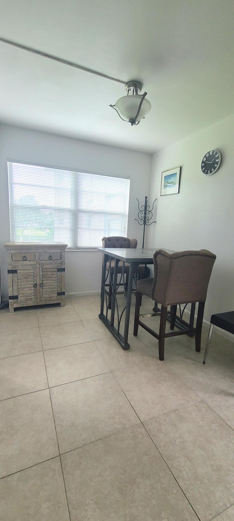 270 Suffolk F Boca Raton, FL 33434 - Photo 12 of 21 a living room with furniture