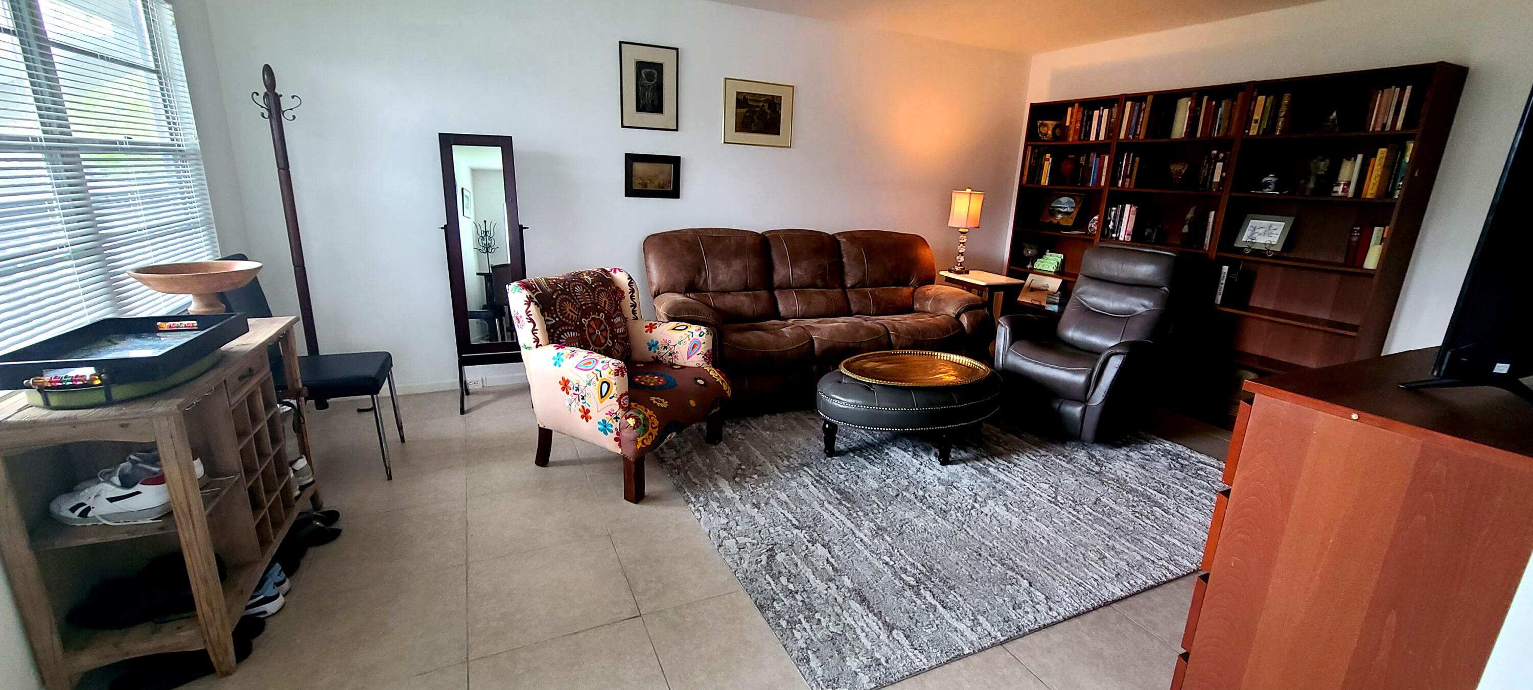 270 Suffolk F Boca Raton, FL 33434 - Photo 6 of 21 a living room with furniture and a rug