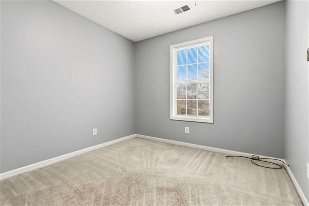 4170 Jewel Terrace Conley, GA 30288 - Photo 13 of 29 a view of an empty room with a window