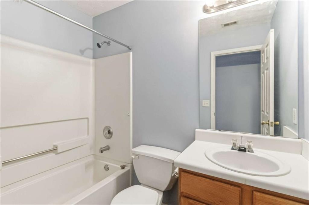 4170 Jewel Terrace Conley, GA 30288 - Photo 15 of 29 a bathroom with a sink toilet and shower