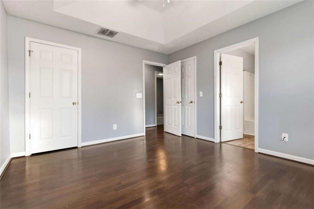 4170 Jewel Terrace Conley, GA 30288 - Photo 17 of 29 a view of an empty room with wooden floor