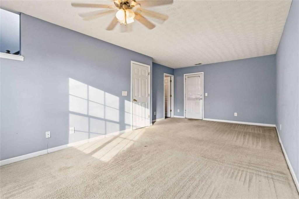 4170 Jewel Terrace Conley, GA 30288 - Photo 18 of 29 a view of an empty room with a window
