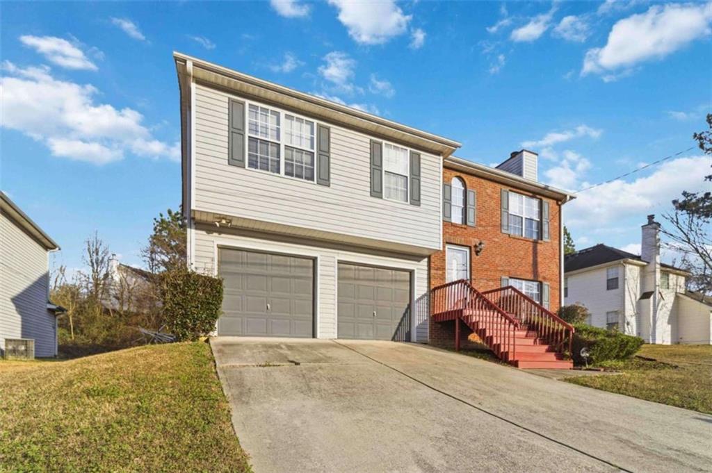 4170 Jewel Terrace Conley, GA 30288 - Photo 4 of 29 a view of a house with a outdoor space