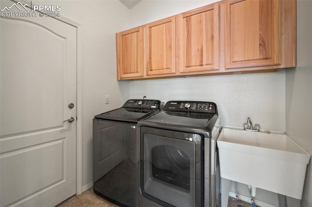 10658 Pictured Rocks Drive Peyton, CO 80831 - Photo 14 of 46 Laundry on main level