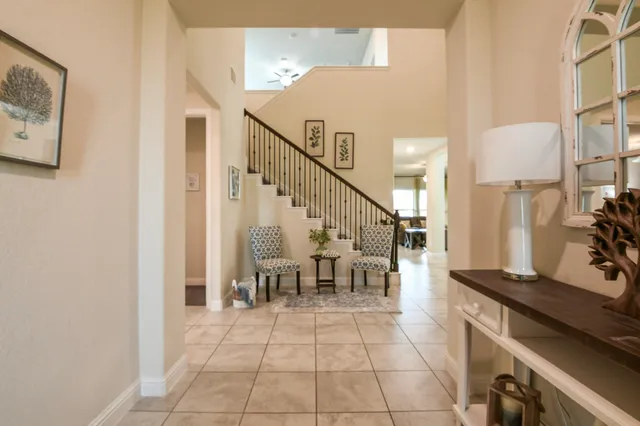 a dining room with table and chairs