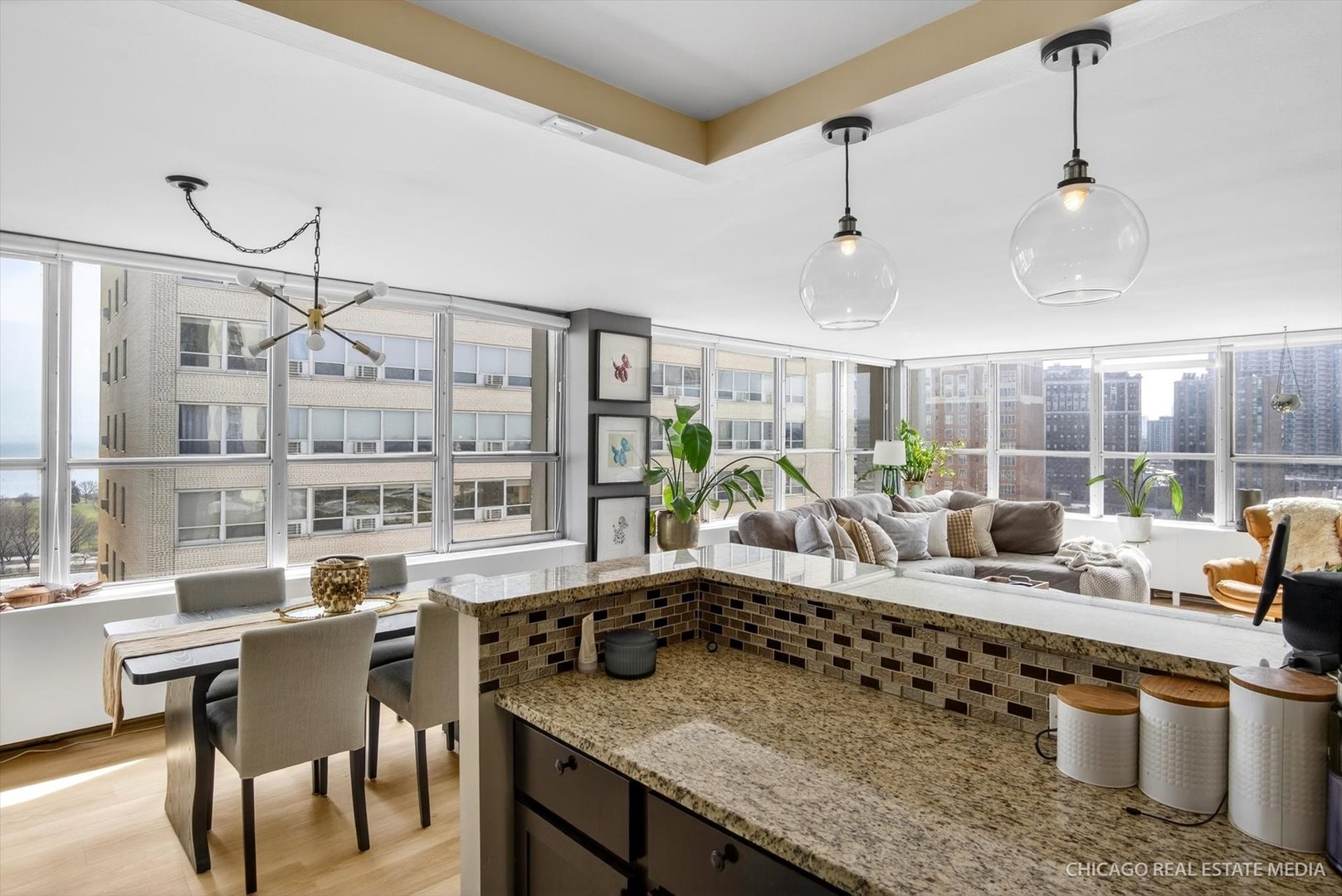 655 West Irving Park Road, Unit 1101 Chicago, IL 60613 - Photo 15 of 26 a very nice looking dining room with a table and chairs