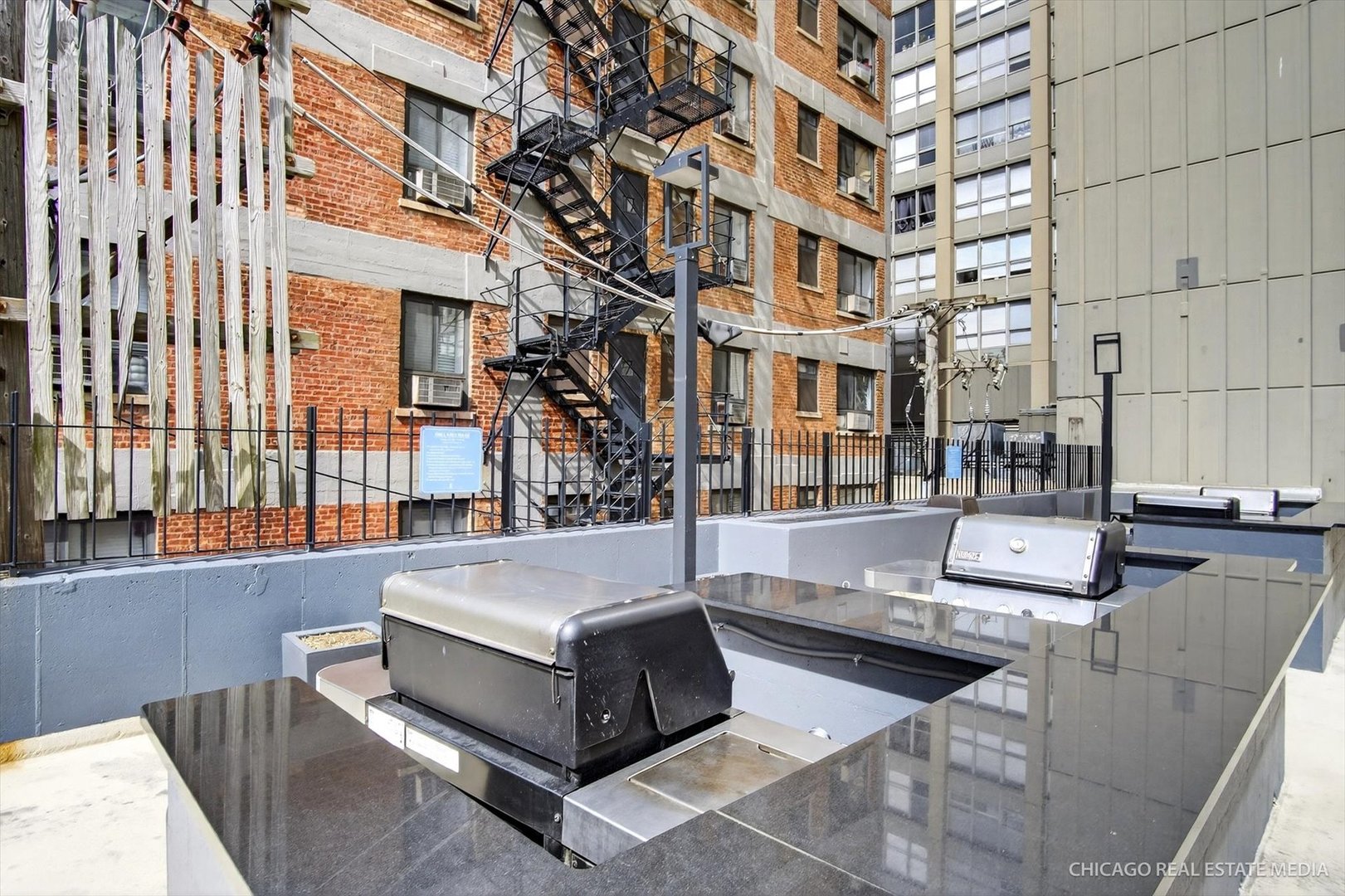 655 West Irving Park Road, Unit 1101 Chicago, IL 60613 - Photo 24 of 26 a view of an outdoor space with swimming pool