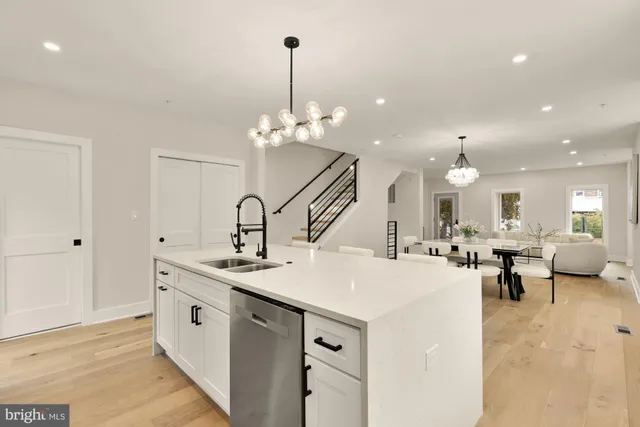 a very nice looking dining room with a table and chairs