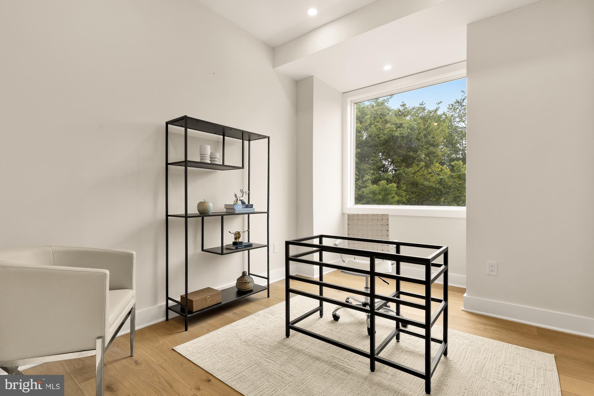 1631 G Street Southeast Washington, DC 20003 - Photo 20 of 42 a bedroom with a bed and a window