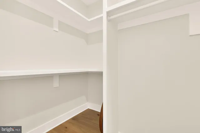 a view of an empty walk in closet