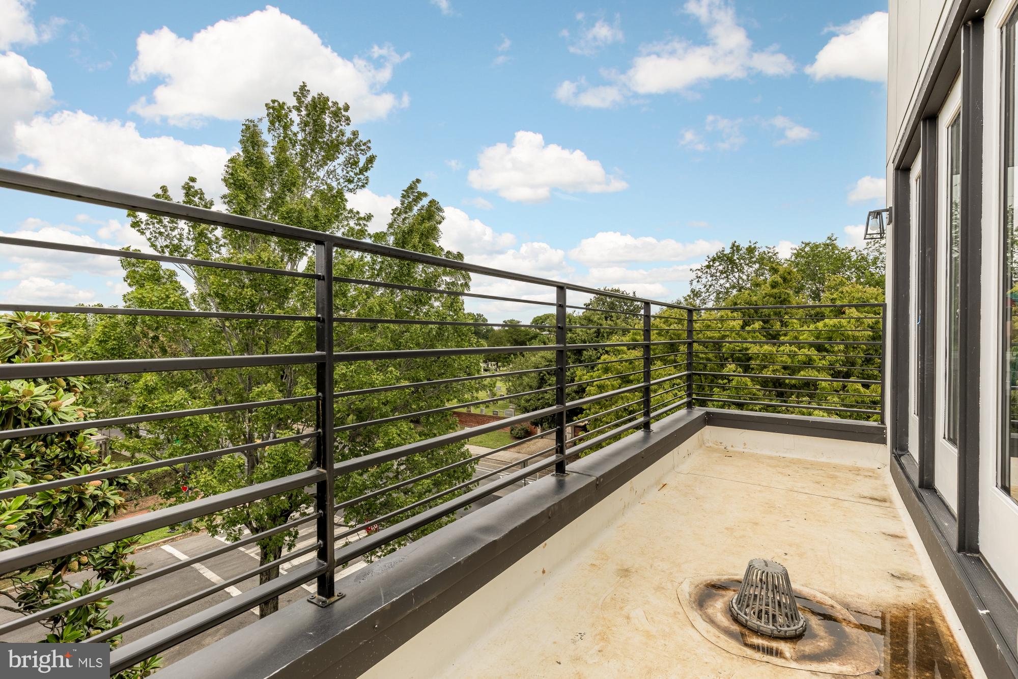 1631 G Street Southeast Washington, DC 20003 - Photo 29 of 42 a view of a balcony with floor to ceiling windows