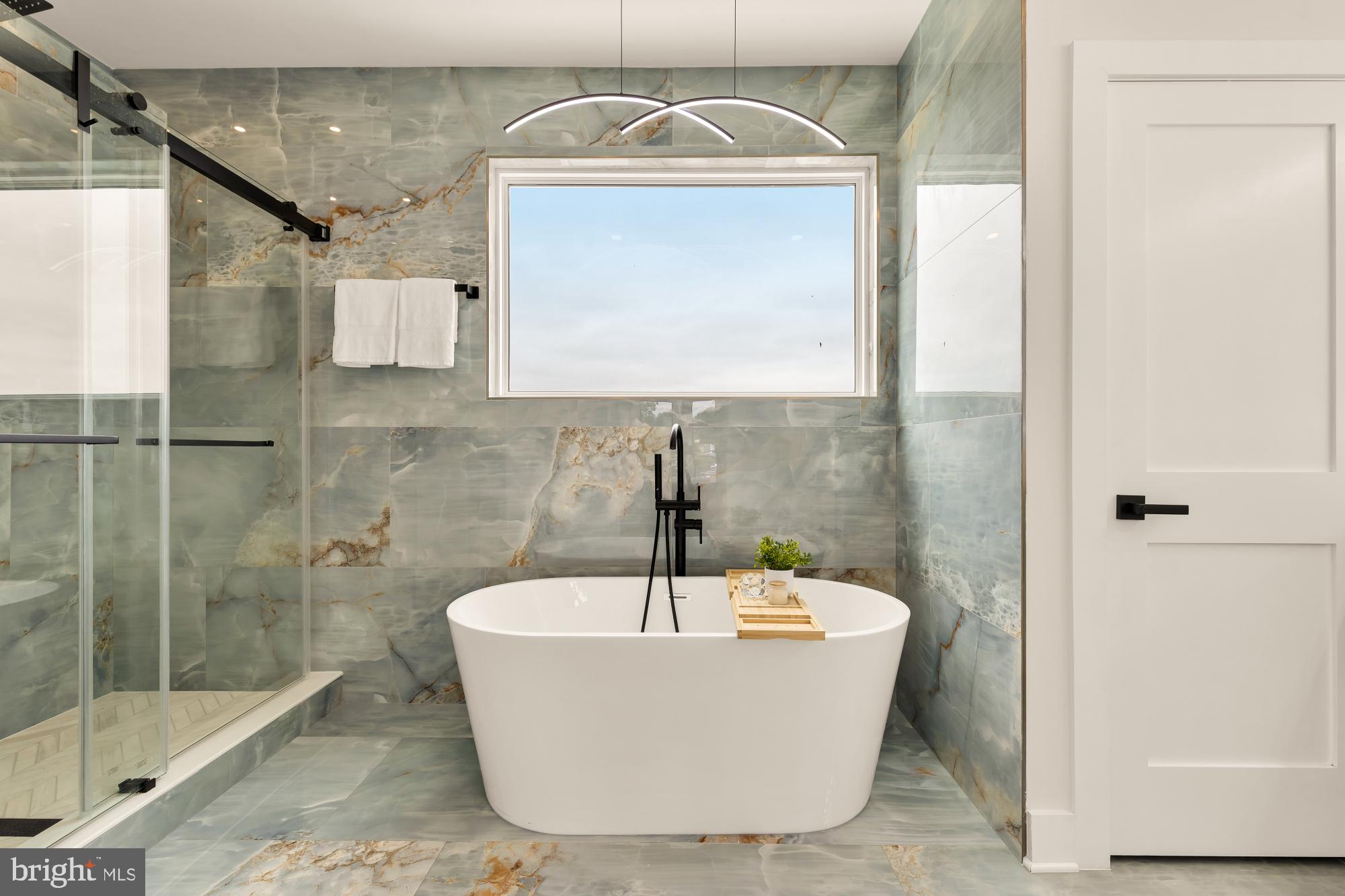 1631 G Street Southeast Washington, DC 20003 - Photo 31 of 42 a bathroom with a bathtub and shower