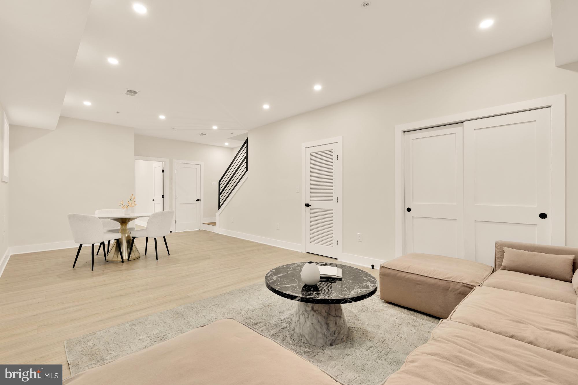 1631 G Street Southeast Washington, DC 20003 - Photo 37 of 42 a living room with furniture and a table