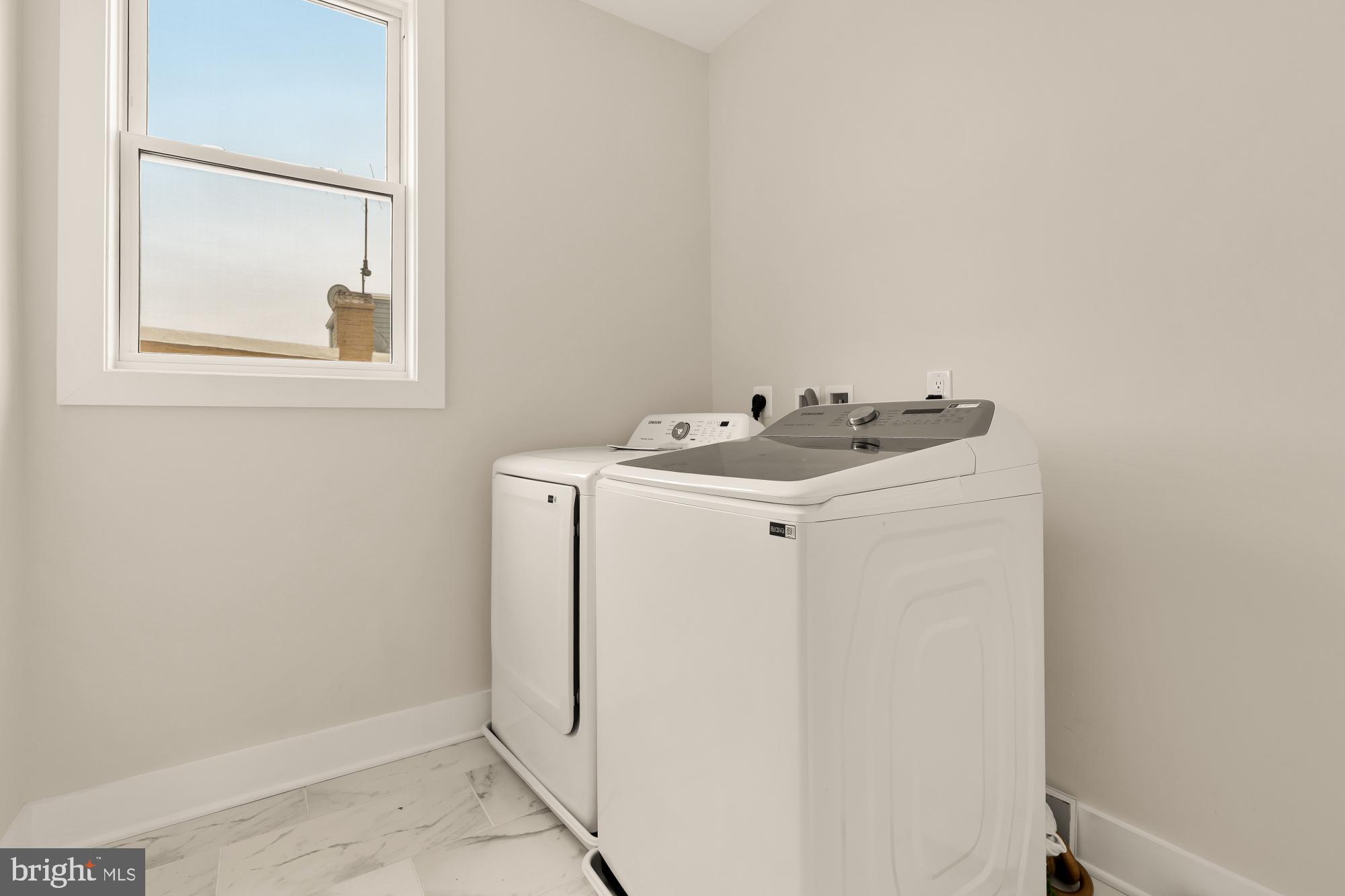 1631 G Street Southeast Washington, DC 20003 - Photo 38 of 42 a utility room with dryer and washer