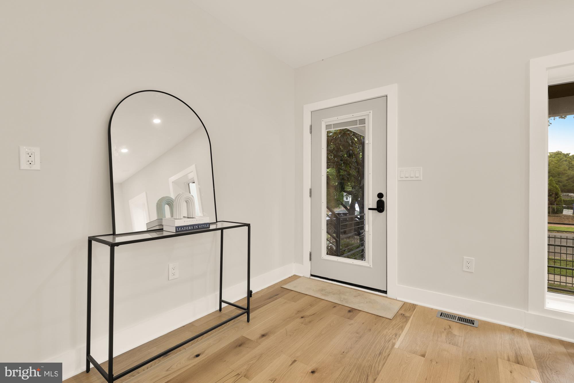 1631 G Street Southeast Washington, DC 20003 - Photo 4 of 42 a view of an entryway with wooden floor