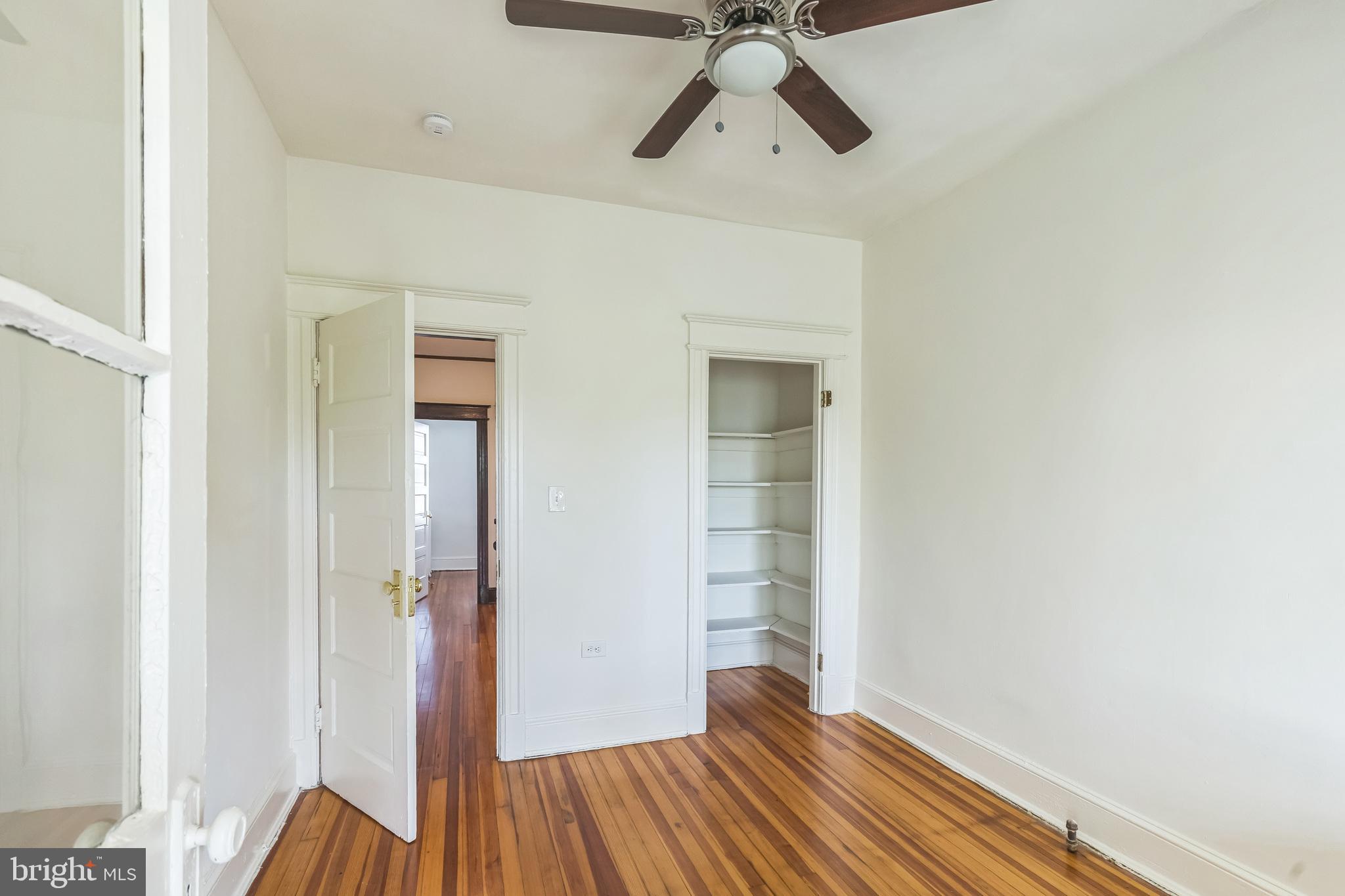 522 Randolph Street Northwest, Unit 1 Washington, DC 20011 - Photo 17 of 33 wooden floor in an empty room