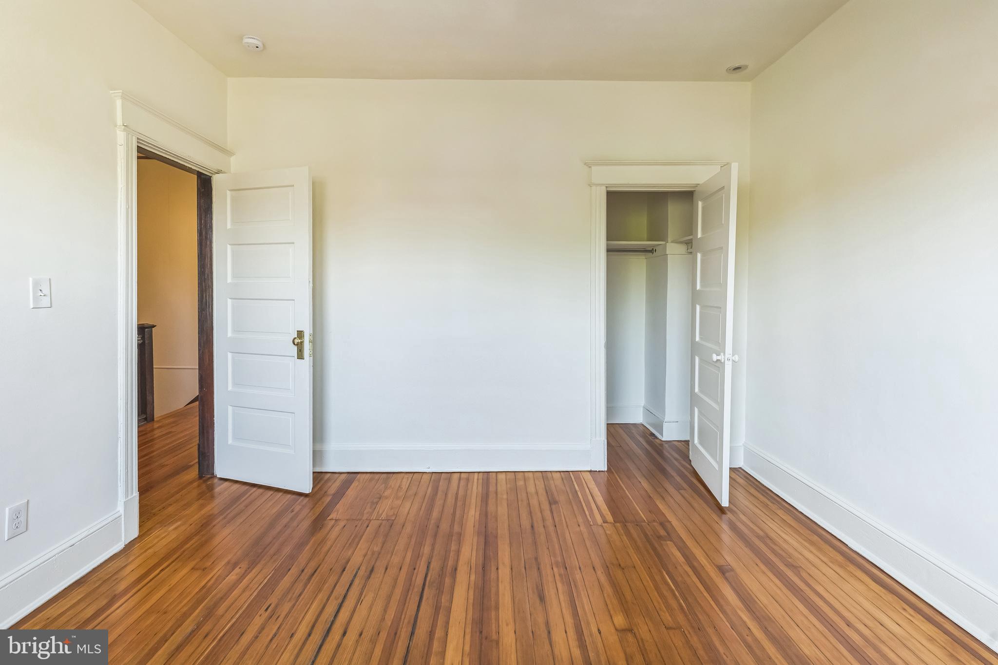 522 Randolph Street Northwest, Unit 1 Washington, DC 20011 - Photo 21 of 33 wooden floor in a empty room