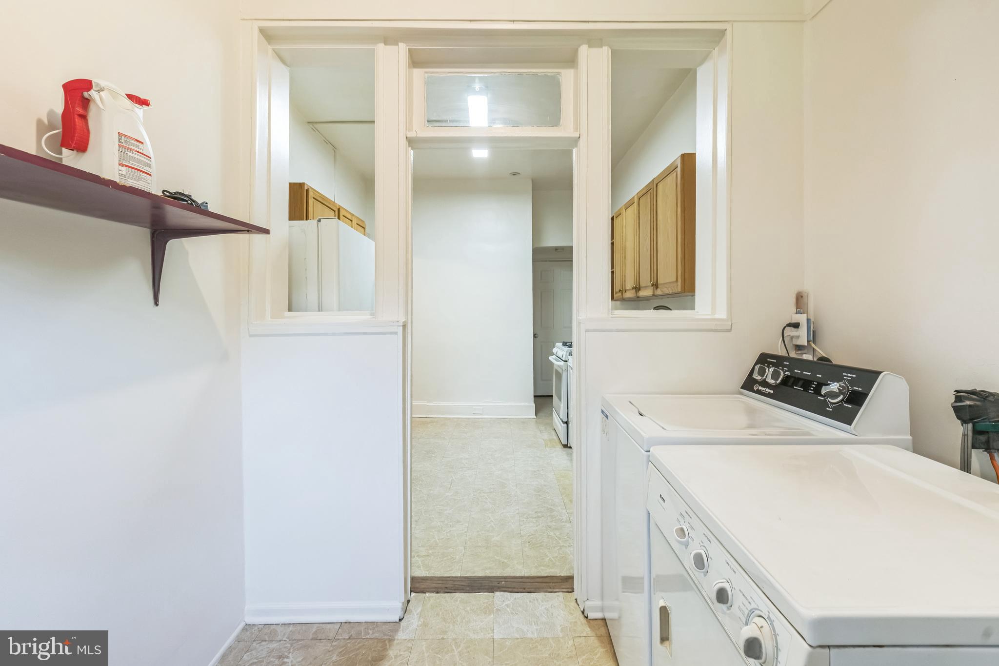 522 Randolph Street Northwest, Unit 1 Washington, DC 20011 - Photo 22 of 33 a utility room with dryer and washer