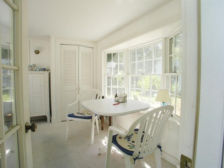 92 Earle Road West Harwich, MA 02671 - Photo 12 of 19 a dining room with furniture and window