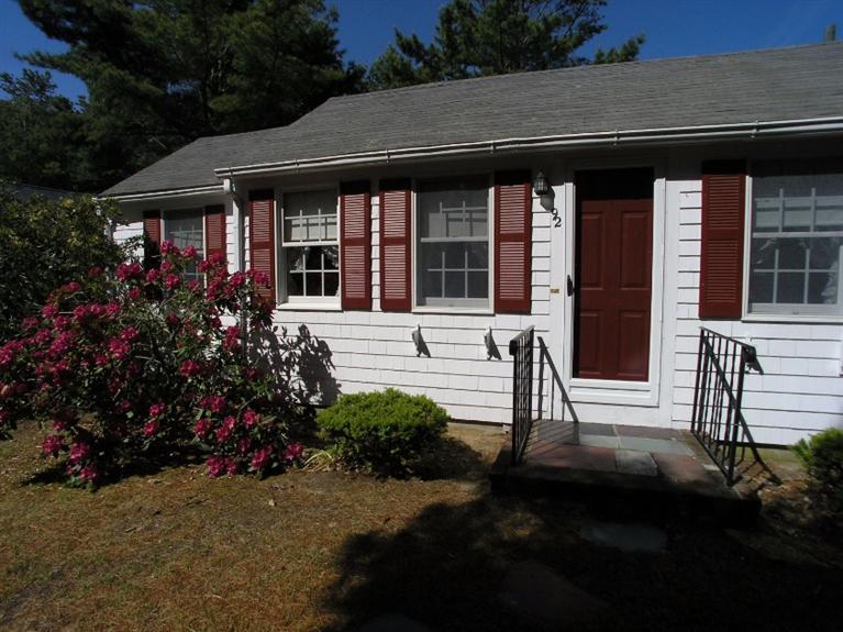 92 Earle Road West Harwich, MA 02671 - Photo 3 of 19 a front view of a house with a garden