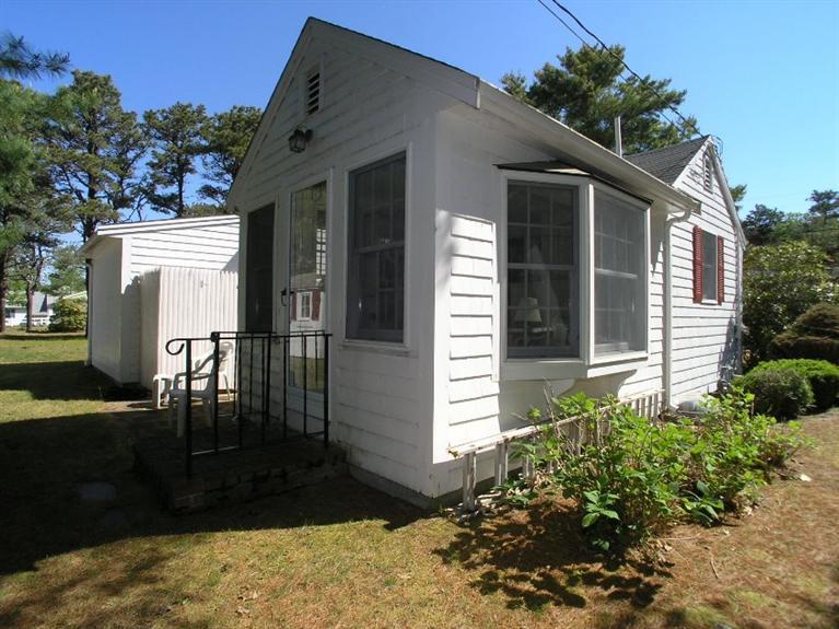 92 Earle Road West Harwich, MA 02671 - Photo 5 of 19 a view of backyard of the house