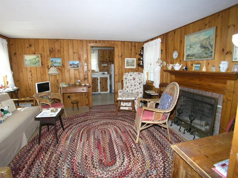 92 Earle Road West Harwich, MA 02671 - Photo 8 of 19 a living room with furniture and large windows