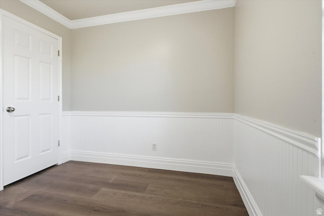 4496 West 11800 South South Jordan, UT 84009 - Photo 27 of 33 Empty room featuring crown molding, wainscoting, and dark wood finished floors