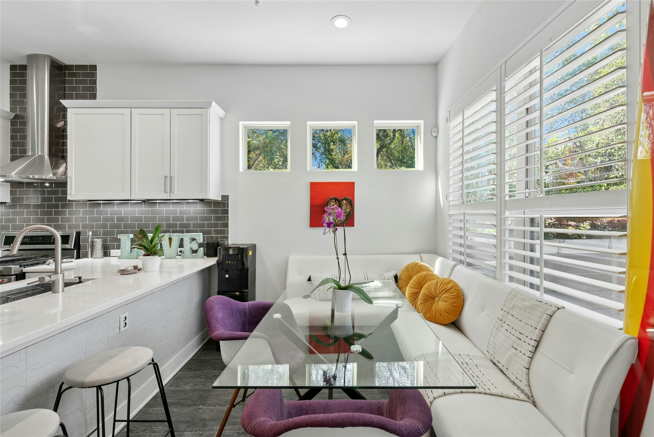 404 West Alpine Road, Unit 17 Austin, TX 78704 - Photo 17 of 35 Dining area featuring healthy amount of natural light, dark wood-style floors, and recessed lighting