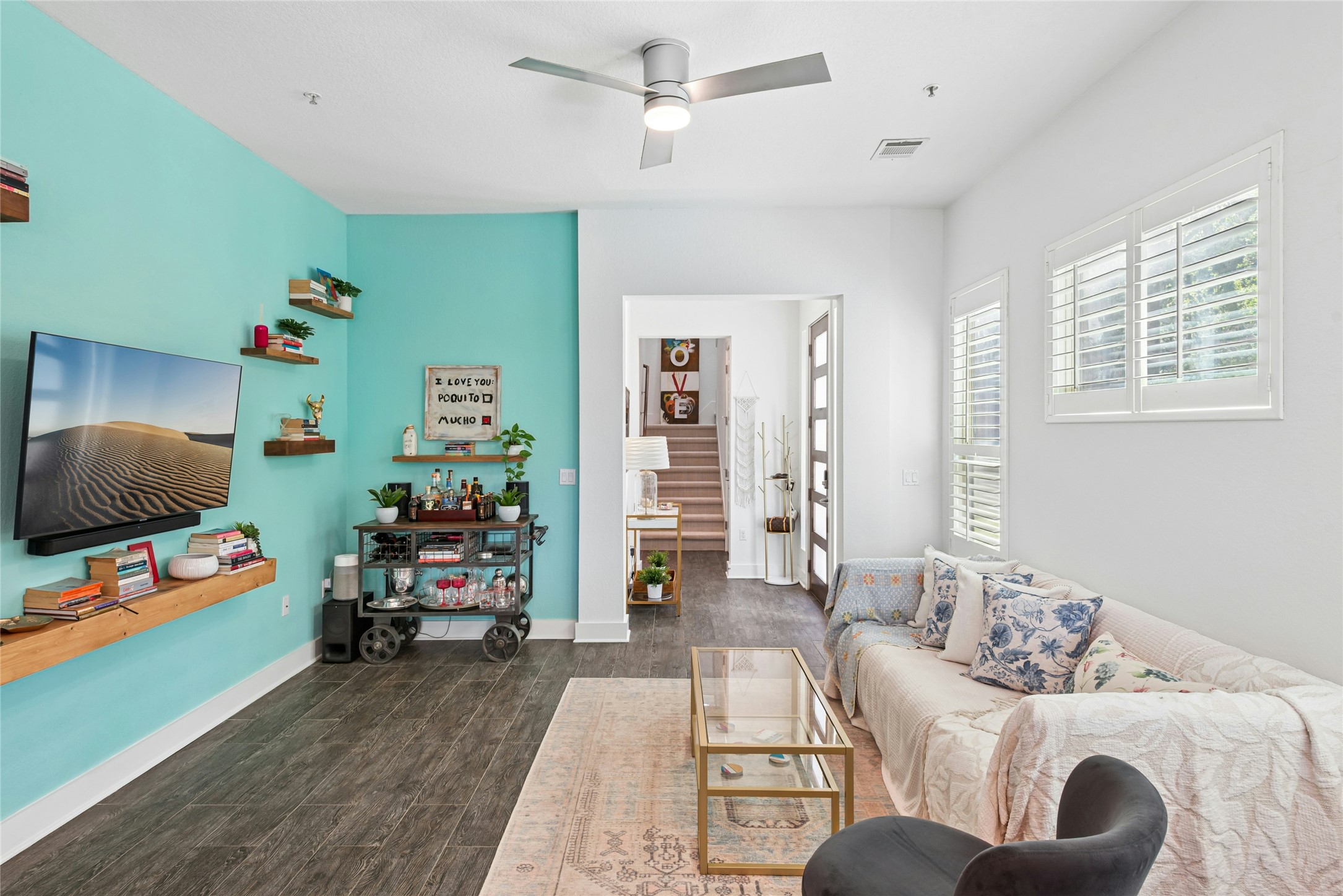 404 West Alpine Road, Unit 17 Austin, TX 78704 - Photo 19 of 35 Living room with wood tiled floors and ceiling fan