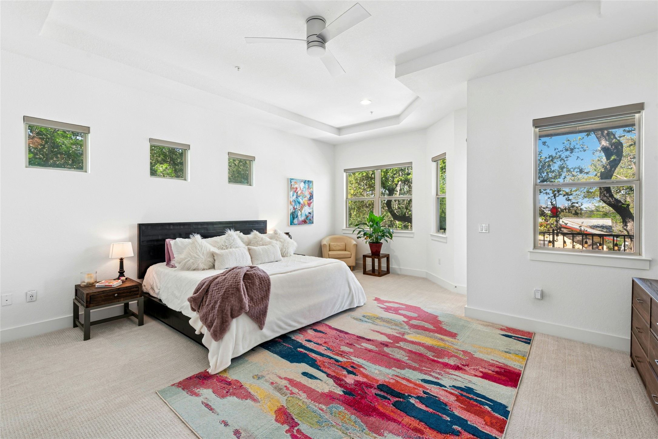404 West Alpine Road, Unit 17 Austin, TX 78704 - Photo 24 of 35 Bedroom featuring a tray ceiling, light colored carpet, ceiling fan, and recessed lighting