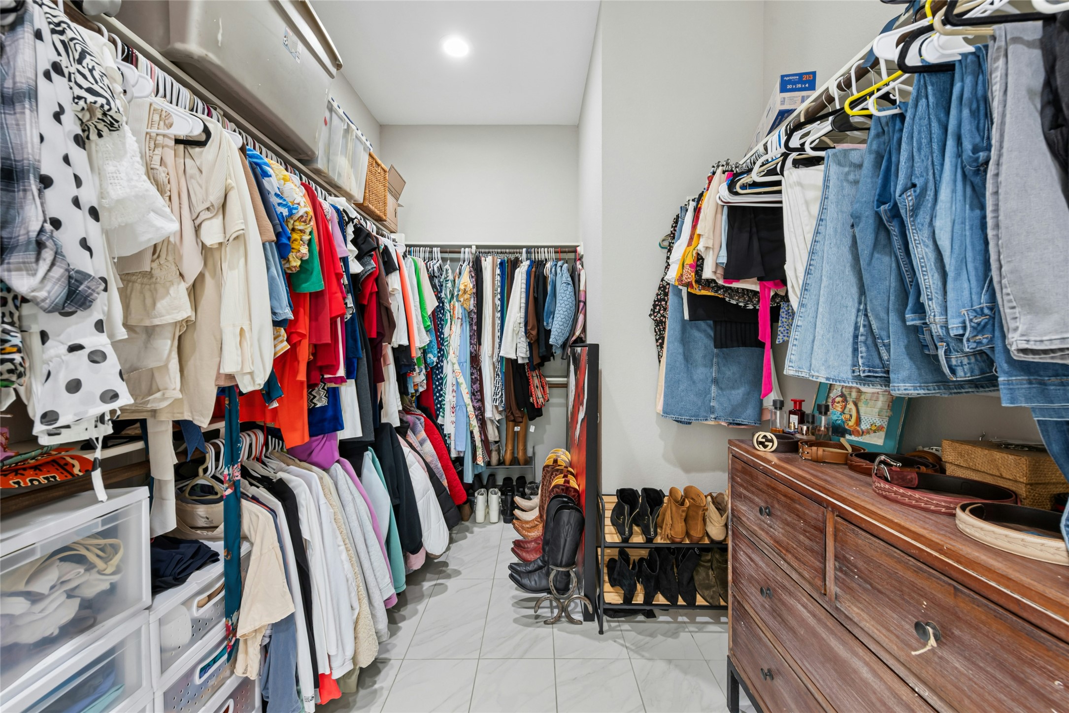 404 West Alpine Road, Unit 17 Austin, TX 78704 - Photo 29 of 35 Walk in closet with light tile patterned floors