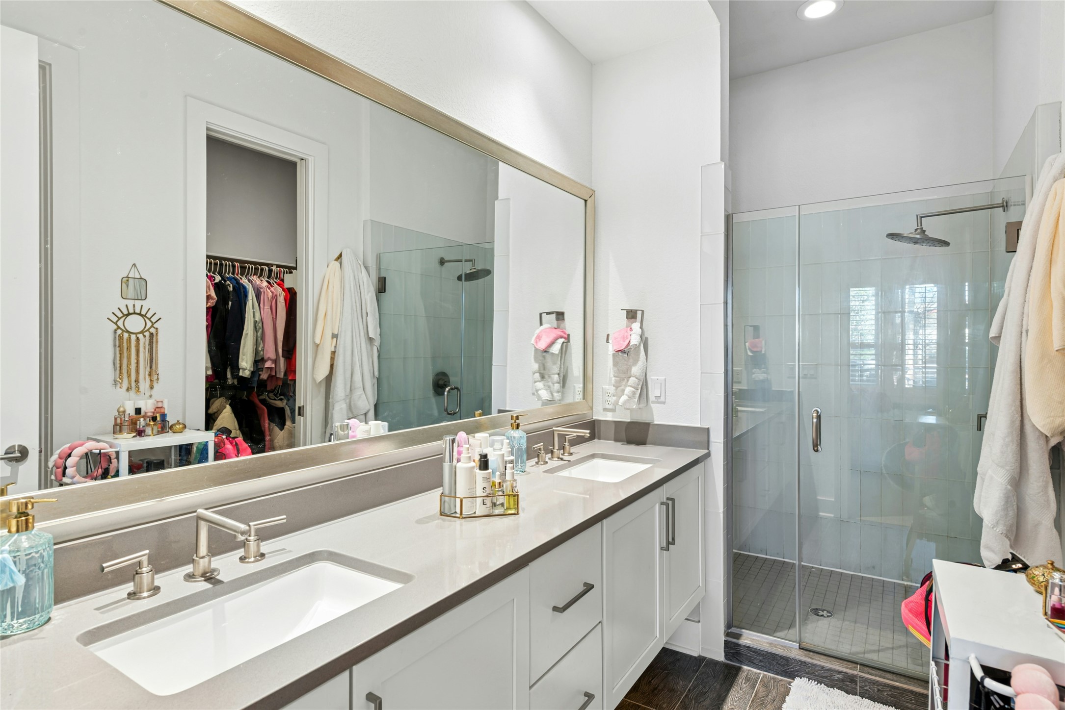 404 West Alpine Road, Unit 17 Austin, TX 78704 - Photo 32 of 35 Full bath featuring double vanity, a stall shower, a spacious closet, and recessed lighting