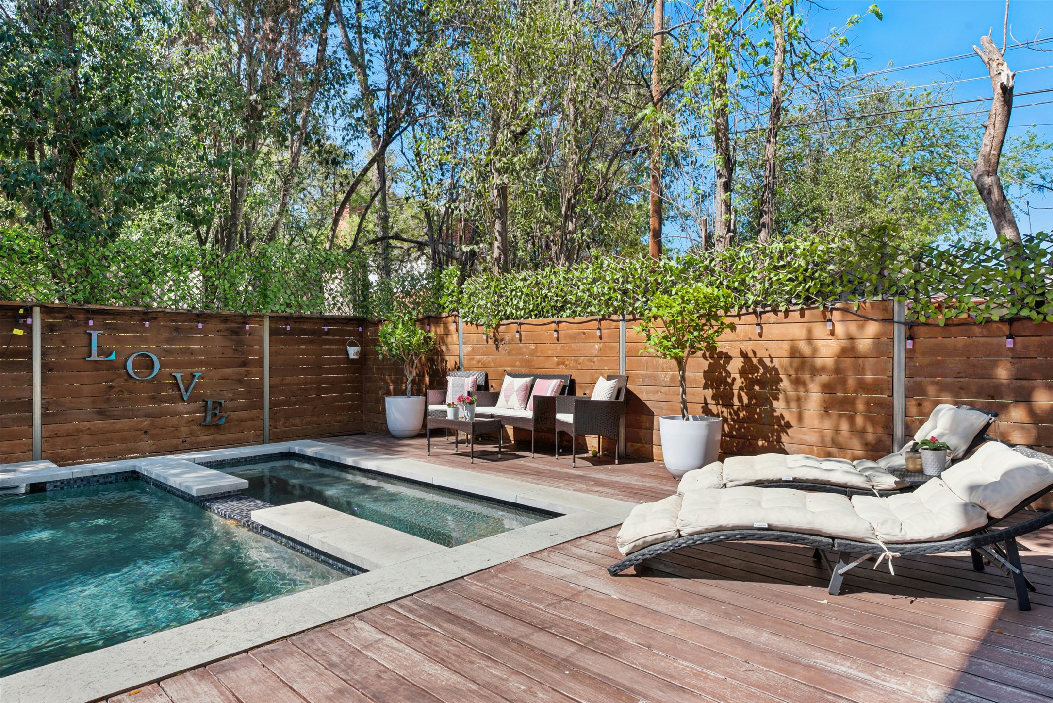 404 West Alpine Road, Unit 17 Austin, TX 78704 - Photo 7 of 35 Relaxing pool / spa featuring a fenced backyard, a deck, and outdoor lounge area