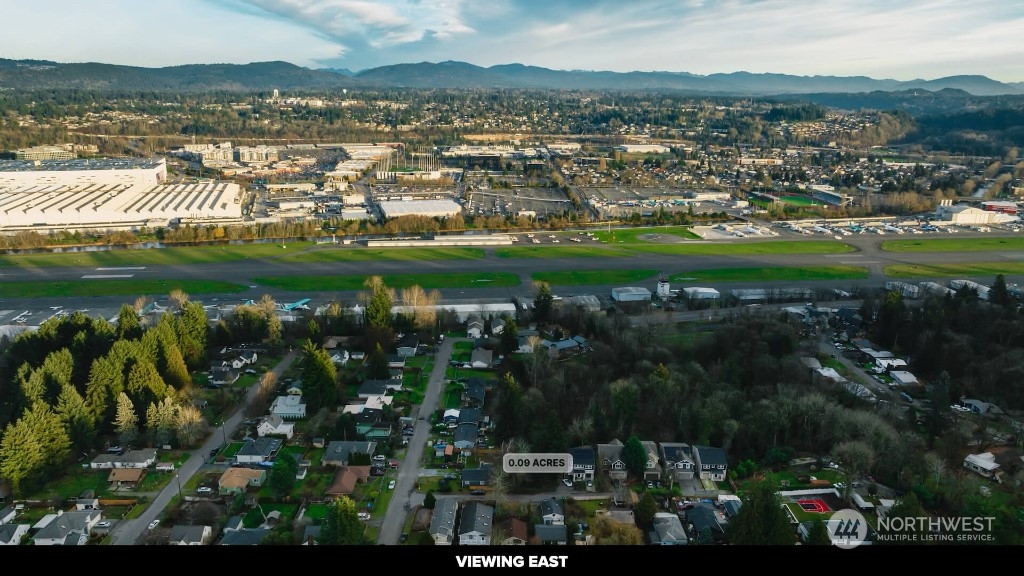 672 Lind Avenue Northwest Renton, WA 98057 - Photo 13 of 25 a view of a lake with a city