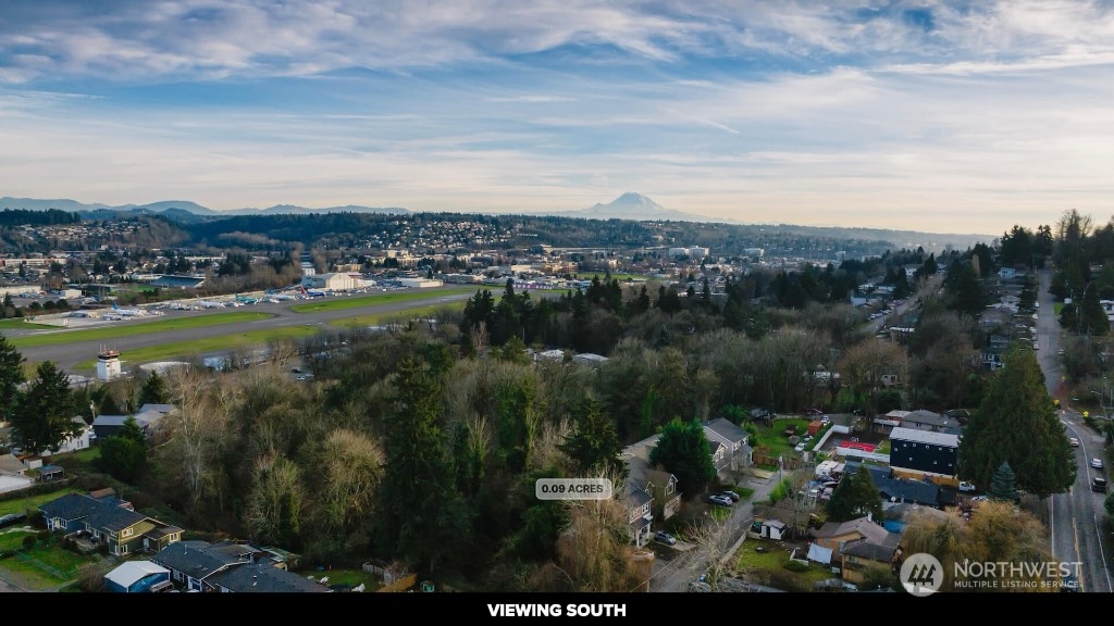 672 Lind Avenue Northwest Renton, WA 98057 - Photo 16 of 25 a view of lake and mountain