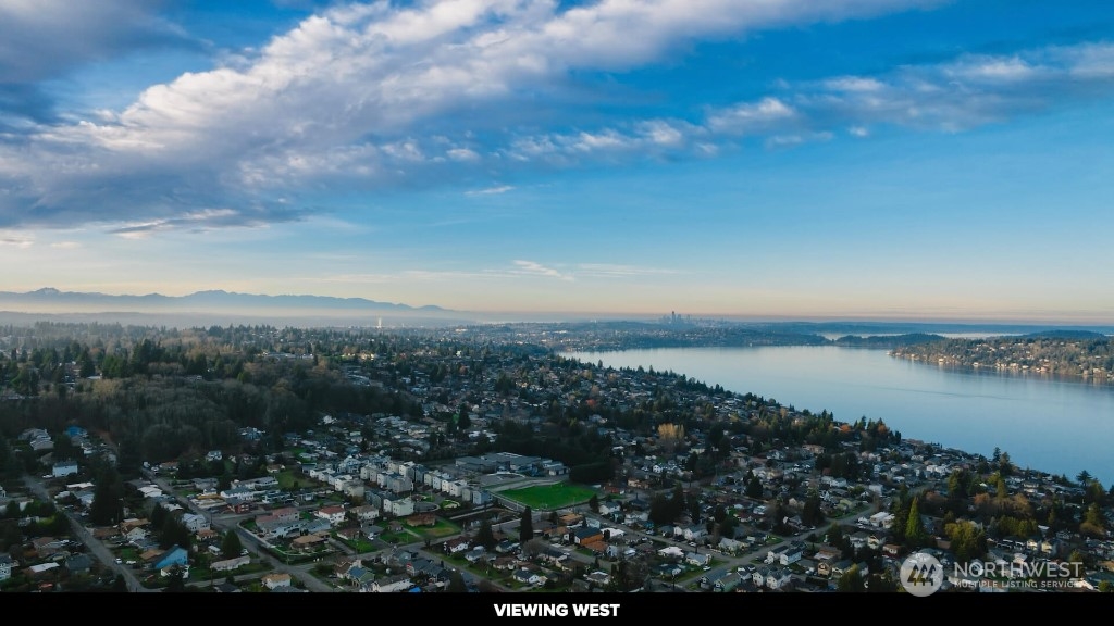 672 Lind Avenue Northwest Renton, WA 98057 - Photo 18 of 25 a view of a lake and mountain