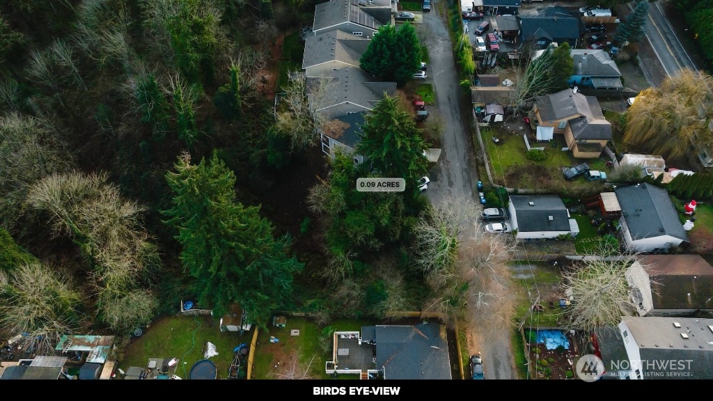 672 Lind Avenue Northwest Renton, WA 98057 - Photo 20 of 25 an aerial view of houses with yard