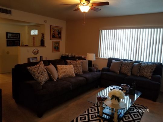 301 West Perdew Avenue Ridgecrest, CA 93555 - Photo 7 of 17 a living room with furniture and wooden floor