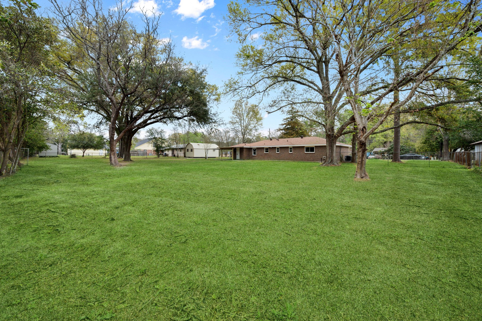 16746 Main Street Splendora, TX 77372 - Photo 24 of 24 a view of a park with large trees