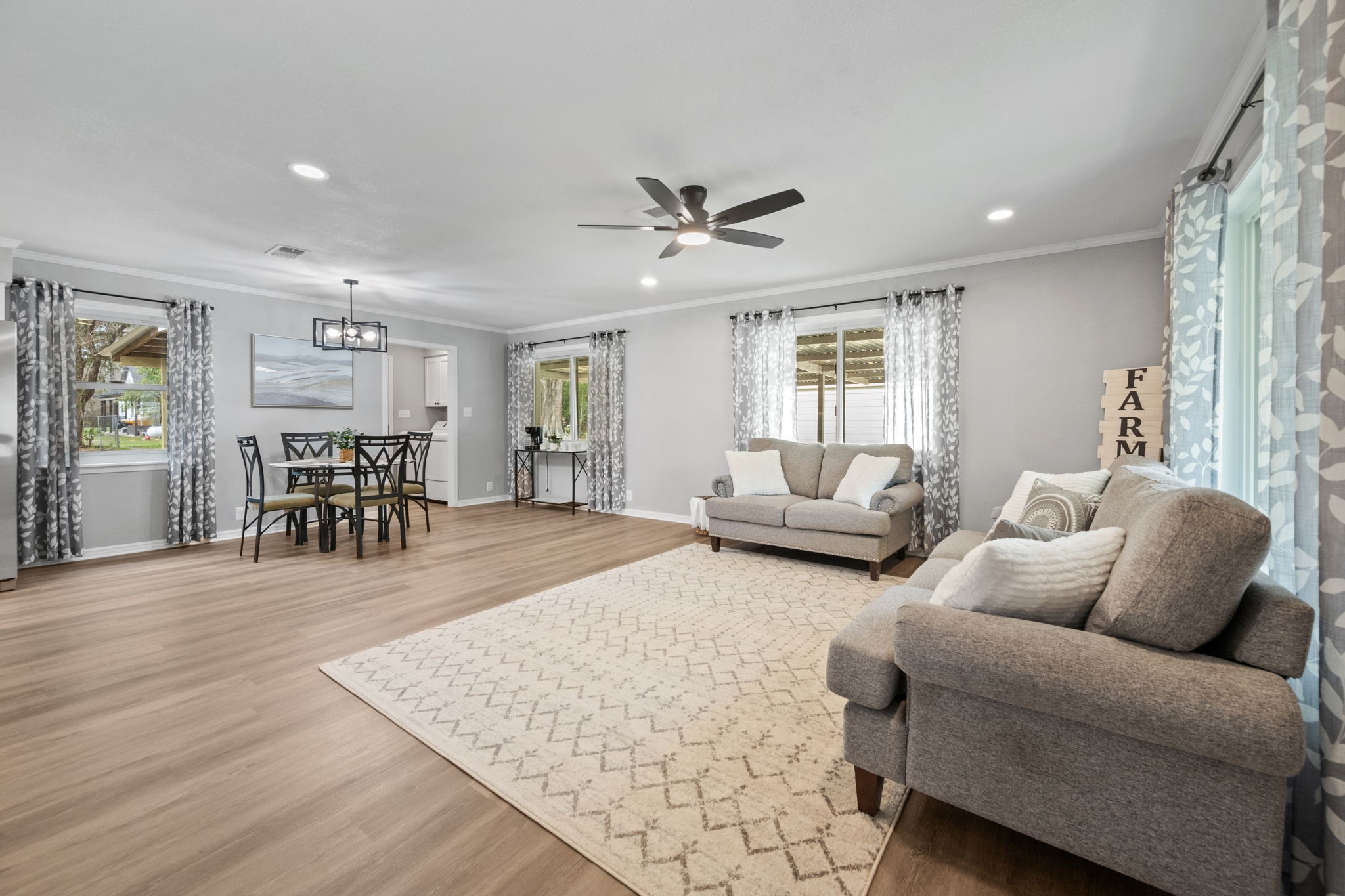 16746 Main Street Splendora, TX 77372 - Photo 9 of 24 a living room with furniture and wooden floor