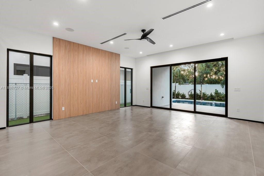 1215 Northeast 11th Avenue, Unit B Fort Lauderdale, FL 33304 - Photo 43 of 62 a view of an empty room with a window