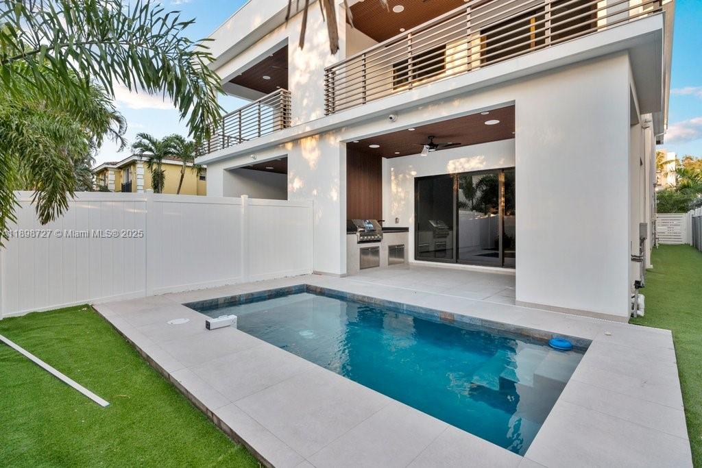 1215 Northeast 11th Avenue, Unit B Fort Lauderdale, FL 33304 - Photo 62 of 62 a view of a house with a swimming pool