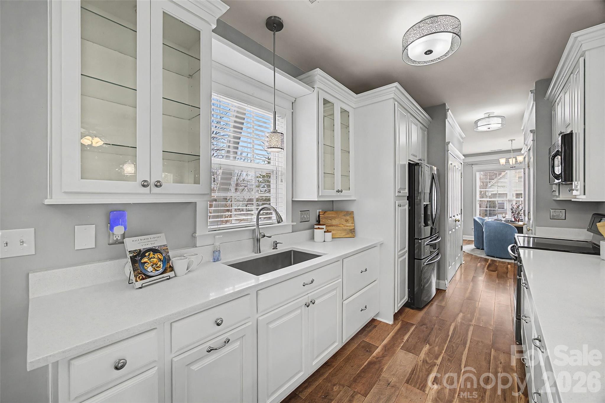 8123 Bud Henderson Road Huntersville, NC 28078 - Photo 14 of 48 a kitchen with cabinets a sink and appliances