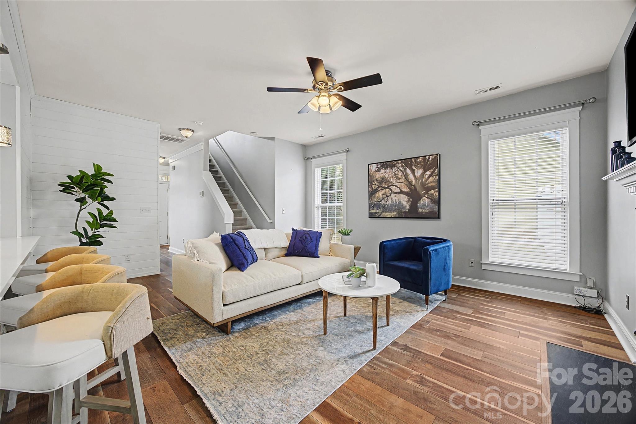 8123 Bud Henderson Road Huntersville, NC 28078 - Photo 18 of 48 a living room with furniture and a rug
