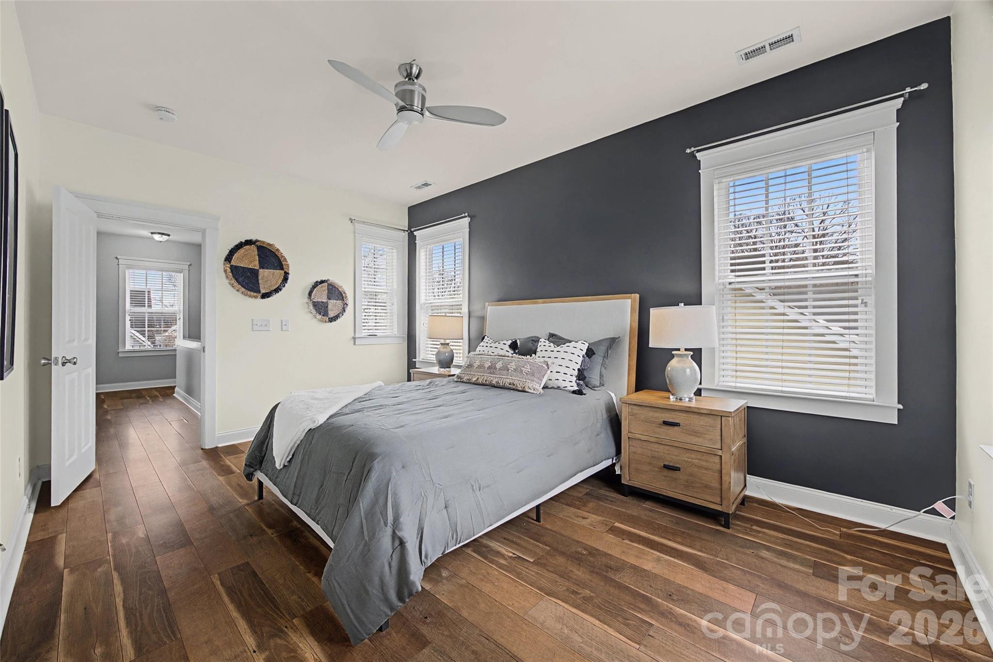 8123 Bud Henderson Road Huntersville, NC 28078 - Photo 25 of 48 a spacious bedroom with a bed and a window